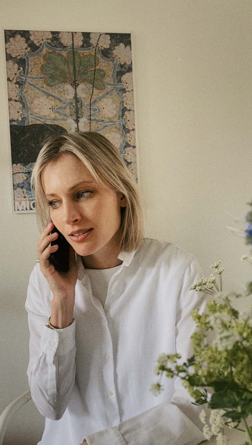 Caregiver on the phone at home